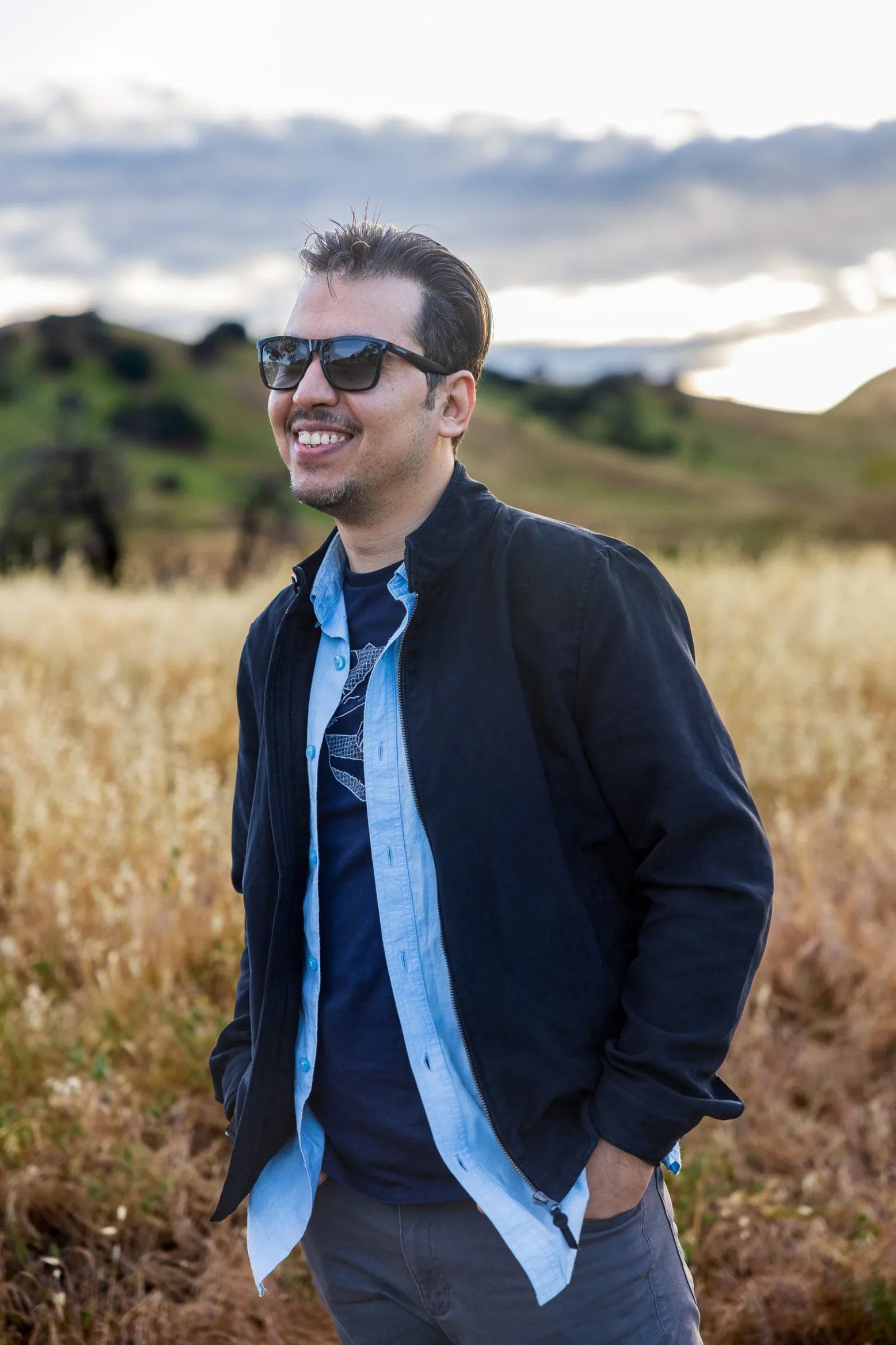 Outdoor headshot of a man in the Peninsula foothills, natural light