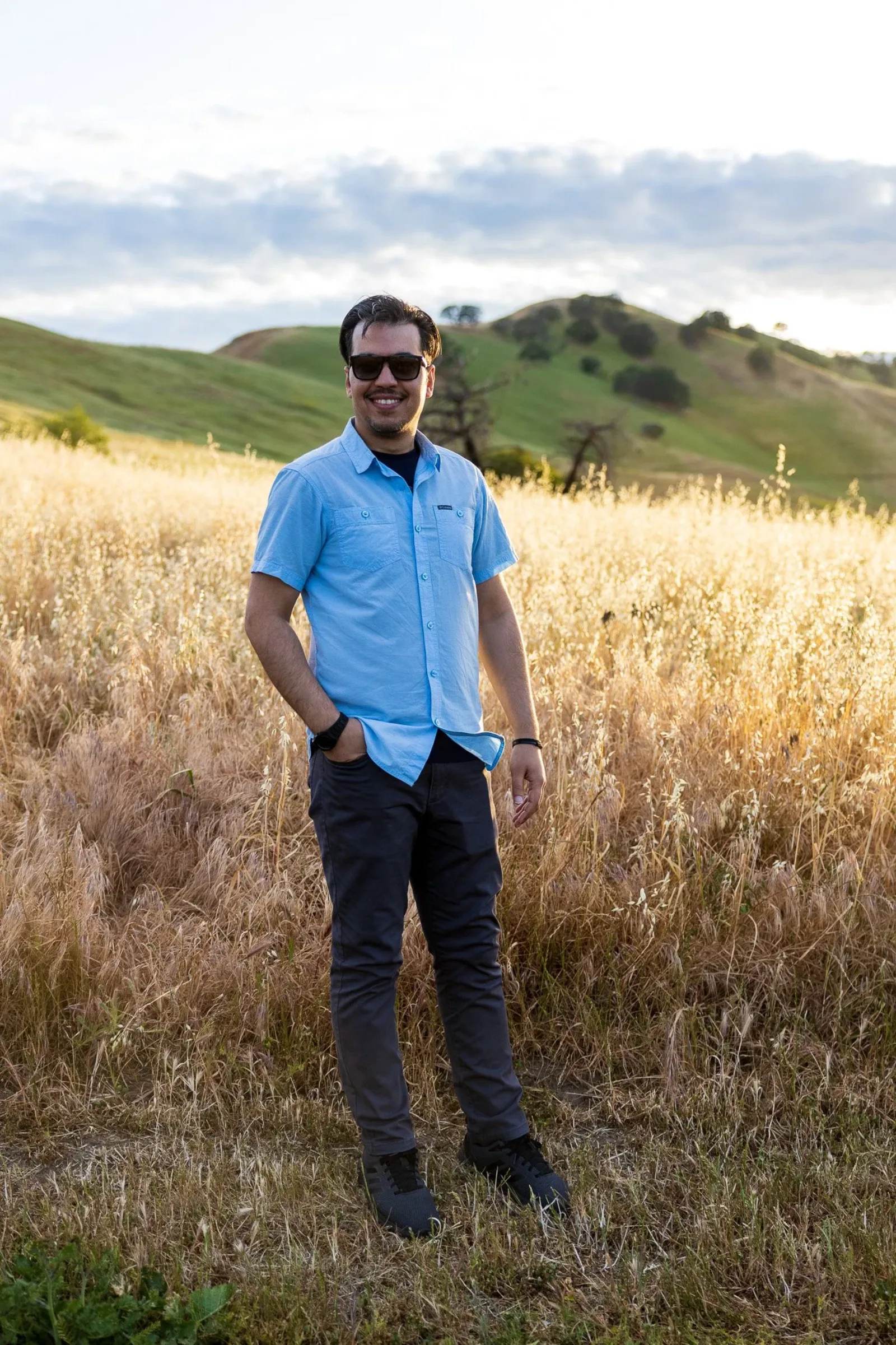 Professional headshot of a man, consistent lighting and framing