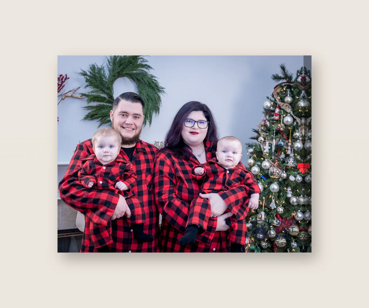 16x20 Canvas of a family in matching red flannel by the Christmas tree