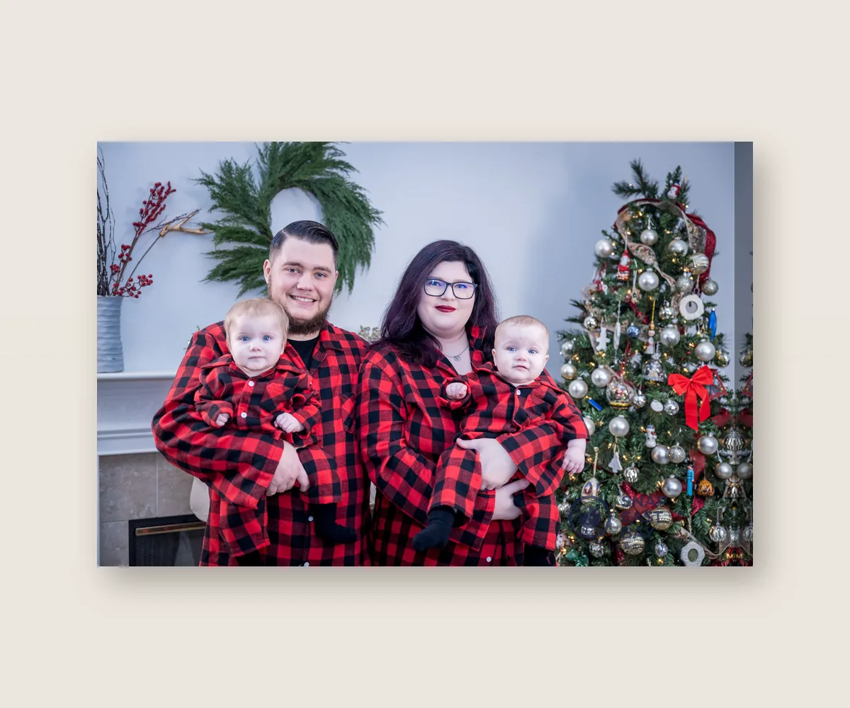 20x30 Canvas of a family in matching red flannel by the Christmas tree