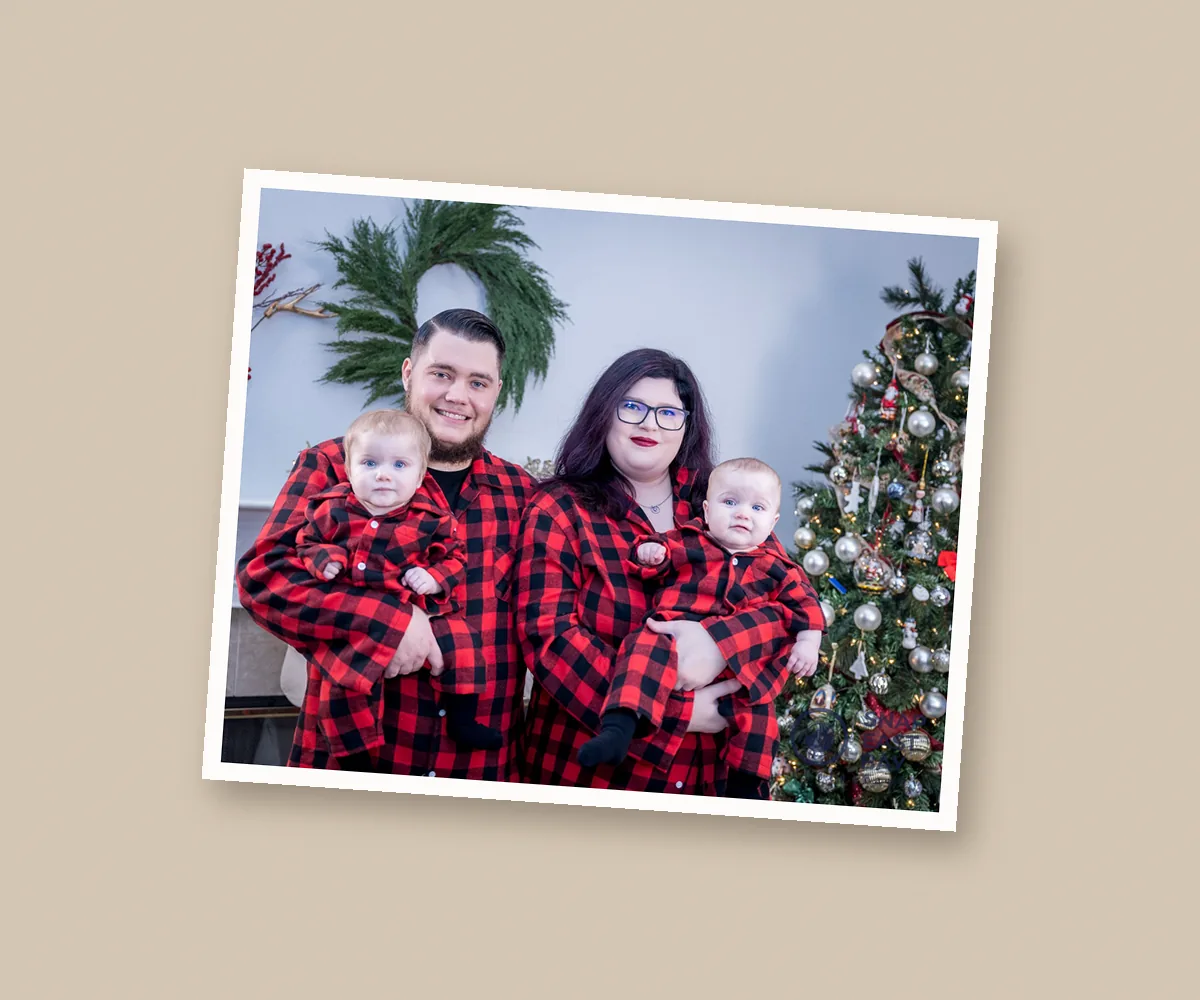 8x10 Print of a family in matching red flannel by the Christmas tree